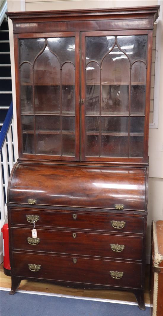 A George IV mahogany cylinder bureau bookcase W.106cm